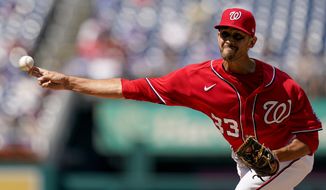 Washington Nationals relief pitcher Steve Cishek pitches in the seventh inning of a baseball game against the Chicago Cubs at Nationals Park, Wednesday, Aug. 17, 2022, in Washington. The Cubs won 3-2. (AP Photo/Andrew Harnik)