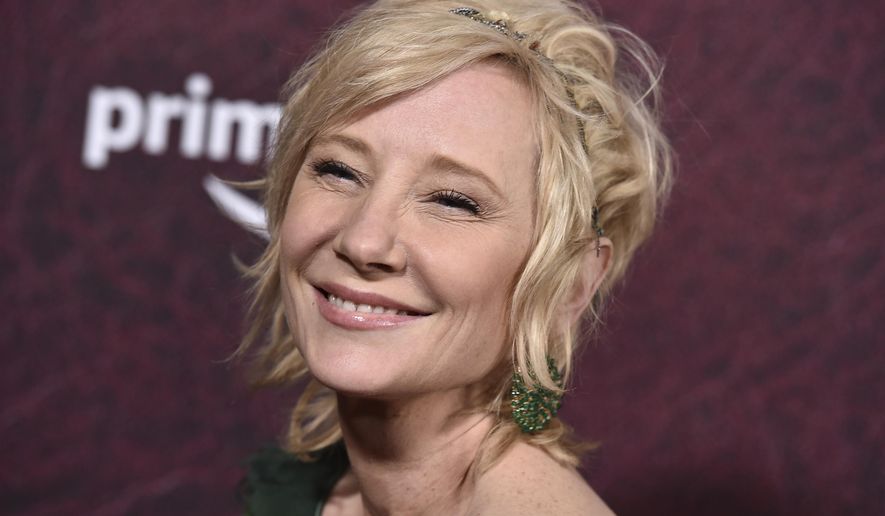 Anne Heche arrives at the premiere of &quot;The Tender Bar&quot; at the TCL Chinese Theatre, on Dec. 12, 2021, in Los Angeles. The coroner&#x27;s office says actor Heche died from burns and inhalation injury after her fiery car crash and the death has been ruled an accident. The cause of her death was released on the Los Angeles County coroner&#x27;s website Wednesday, Aug. 17, 2022, although a formal autopsy report is still being completed. (Photo by Jordan Strauss/Invision/AP, File)