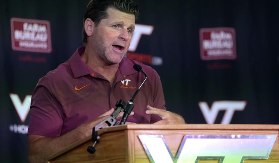 Virginia Tech head coach Brent Pry talks about his team during Media Day in the Beamer-Lawson Indoor Practice Facility in Blacksburg, Va., Wednesday, Aug. 10, 2022. (Matt Gentry/The Roanoke Times via AP) **FILE**