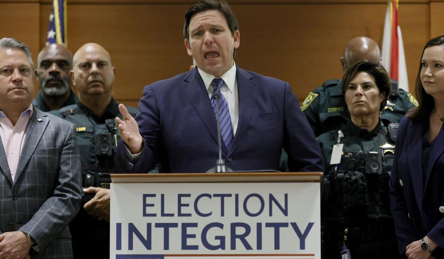 Florida Gov. Ron DeSantis speaks during a news conference at the Broward County Courthouse in Fort Lauderdale, Fla. on Thursday, Aug. 18, 2022. Florida Gov. Ron DeSantis on Thursday announced criminal charges against 20 people for illegally voting in 2020, the first major public move from the Republican&#39;s new election police unit. (Amy Beth Bennett/South Florida Sun-Sentinel via AP)