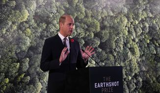 Britain&#39;s Prince William speaks during a meeting with Earthshot prize winners and finalists at the Glasgow Science Center on the sidelines of the COP26 U.N. Climate Summit in Glasgow, Scotland, Nov. 2, 2021. The conservation charity founded by the prince, who launched the Earthshot Prize, keeps its investments in a bank that is one of the world’s biggest backers of fossil fuels. (AP Photo/Alastair Grant, Pool, File)