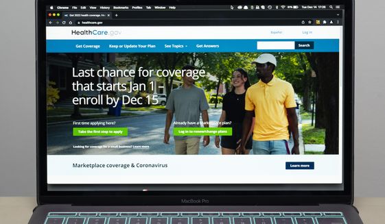 The healthcare.gov website is seen, on Dec. 14, 2021 in Fort Washington, Md. Millions of people in the United States will be spared from big increases in health care costs next year after President Joe Biden signed legislation extending generous subsidies for those who buy plans through federal and state marketplaces. (AP Photo/Alex Brandon, File)