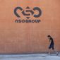 A logo adorns a wall on a branch of the Israeli tech company NSO Group, near the southern Israeli town of Sapir, Aug. 24, 2021. Shalev Hulio, the chief executive of embattled Israeli spyware maker NSO, has stepped down as part of a reorganization, the company announced Sunday, Aug. 21, 2022. NSO, maker of the powerful Pegasus phone surveillance software, has been connected to a number of scandals resulting from alleged misuse of its products by customers. (AP Photo/Sebastian Scheiner, File)