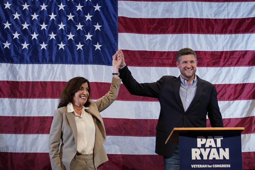 Democratic candidate Pat Ryan, right, and New York Gov. Kathy Hochul appear on stage together during a campaign rally for Ryan, Monday, Aug. 22, 2022, in Kingston, N.Y. Ryan is facing Republican Marc Molinaro in Tuesday&#39;s special election for New York&#39;s 19th Congressional District. (AP Photo/Mary Altaffer)