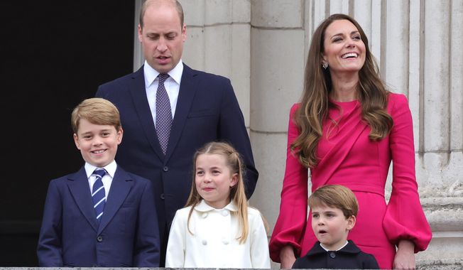 Britain&#x27;s Prince William, Kate, Duchess of Cambridge, Prince George, Princess Charlotte and Prince Louis, appear on the balcony of Buckingham Palace, during the Platinum Jubilee Pageant outside Buckingham Palace in London, June 5, 2022. Prince William and his wife, Kate, will relocate their family from central London to more rural dwellings in Windsor, and all three of their children will attend the same private school near their new home, palace officials said Monday Aug. 22, 2022. (Chris Jackson/PA via AP, File)