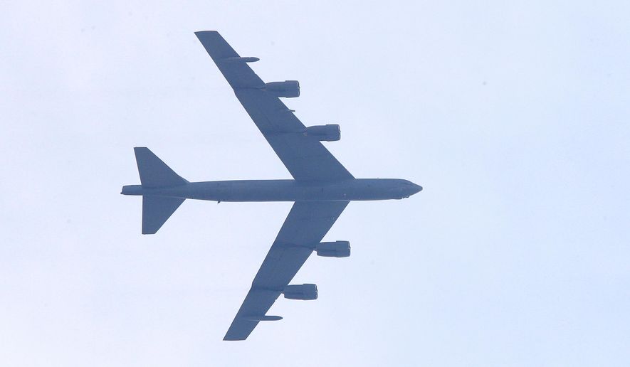 U.S. Air Force B-52 Stratofortress aircraft flies over North Macedonia's capital Skopje, on Monday, Aug. 22, 2022. Two U.S. Air Force B-52 Stratofortress aircrafts assigned to the 23rd Bomb Squadron currently operating out of RAF Fairford, United Kingdom, conducted low approach flyovers on Monday over Southeastern Europe, including North Macedonia, Albania, Montenegro and Croatia. The purpose of each flyover is to demonstrate U.S. commitment and assurance to NATO Allies and partners located in Southeastern Europe. (AP Photo/Boris Grdanoski)