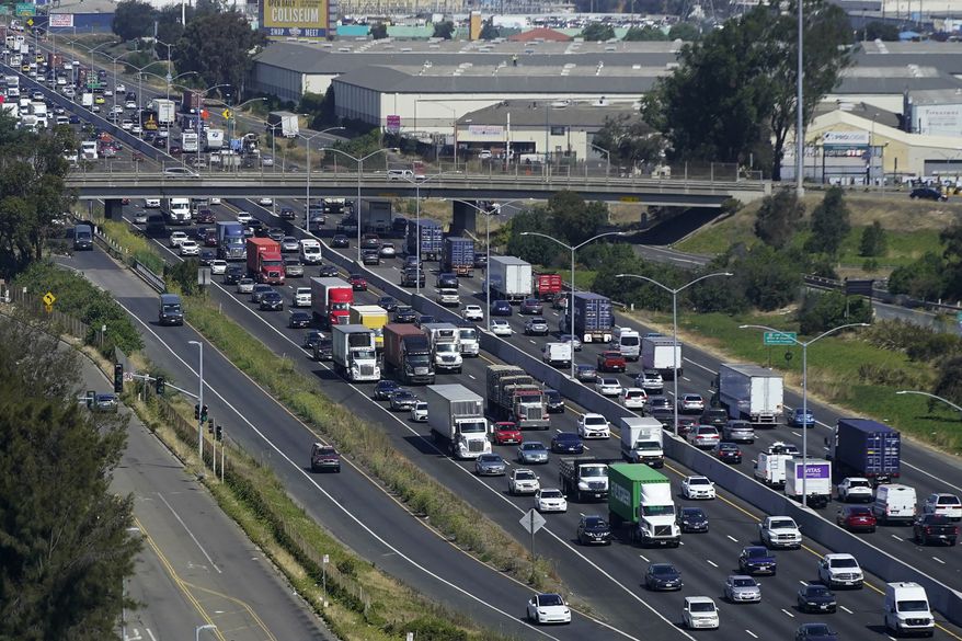 Traffic moves on Interstate 880 in Oakland, Calif., Tuesday, Aug. 16, 2022. (AP Photo/Jeff Chiu) ** FILE **