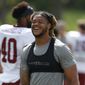 Washington Commanders defensive end Chase Young is seen during an NFL football practice at Inova Sports Performance Center in Ashburn, Va., Tuesday, Aug. 23, 2022. (AP Photo/Luis M. Alvarez)
