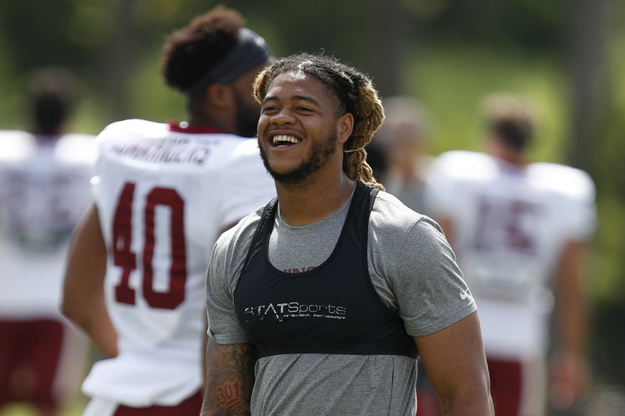 Washington Commanders defensive end Chase Young is seen during an NFL football practice at Inova Sports Performance Center in Ashburn, Va., Tuesday, Aug. 23, 2022. (AP Photo/Luis M. Alvarez)