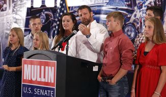 Senate candidate U.S. Rep. Markwayne Mullin gives his victory speech at his watch party, Tuesday, Aug. 23, 2022, in Tulsa, Okla. (Mike Simons/Tulsa World via AP)
