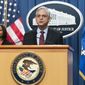 Attorney General Merrick Garland with Assistant Attorney General Kristen Clarke for the Civil Rights Division, speaks during a news conference at the Department of Justice in Washington, Thursday, Aug. 4, 2022. Attorney General Merrick Garland on Tuesday banned political appointees at the Justice Department from participating in political campaign events, changing a longtime policy at an agency under intense political scrutiny and fending off allegations of partisanship. (AP Photo/Manuel Balce Ceneta)