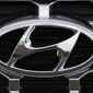 The Hyundai company logo is displayed Sunday, Sept. 12, 2021, in Littleton, Colo. Hyundai and Kia are telling owners, Tuesday, Aug. 23, 2022,  of some large SUVs to park them outdoors and away from structures after a series of fires involving trailer hitch wiring. The Korean automakers are recalling more than 281,000 vehicles in the U.S. because of the problem, but they haven’t figured out how to fix it yet. (AP Photo/David Zalubowski, File)