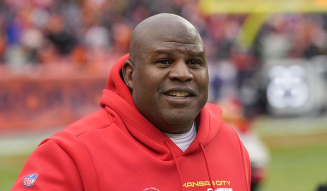 Kansas City Chiefs offensive coordinator Eric Bieniemy is shown before an NFL football game against the Denver Broncos, Saturday, Jan. 8, 2022, in Denver. Bieniemy is still waiting to land a head coaching job after interviewing with 14 teams over the last four years. (AP Photo/David Zalubowski, File) **FILE**