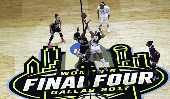 Mississippi State center Teaira McCowan (15) and South Carolina forward A&#39;ja Wilson (22) reach for the ball on the opening tipoff of the final of the NCAA women&#39;s college basketball tournament Final Four, Sunday, April 2, 2017, in Dallas. The NCAA women&#39;s basketball title game will be broadcast on ABC for the first time this season. The championship game, which usually airs in primetime, will be played at 3 p.m. ET. The Final Four is in Dallas this year. (AP Photo/Eric Gay, File) **FILE**