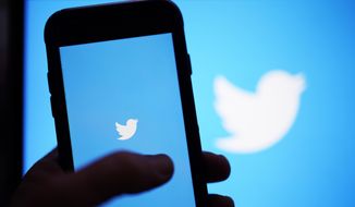 The Twitter application is seen on a digital device, Monday, April 25, 2022, in San Diego. (AP Photo/Gregory Bull, File)