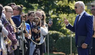 President Joe Biden greets a group of supporters as he arrives at the White House, Wednesday, Aug. 24, 2022, in Washington. Biden is returning from a vacation at his Rehoboth Beach home. (AP Photo/Evan Vucci)