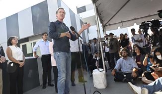 Gov. Gavin Newsom speaks to the media as he visits a Homekey site along Pico Boulevard as he announces awards for homeless housing projects across the state in Los Angeles on Wednesday, Aug. 24, 2022. (Keith Birmingham/The Orange County Register via AP)