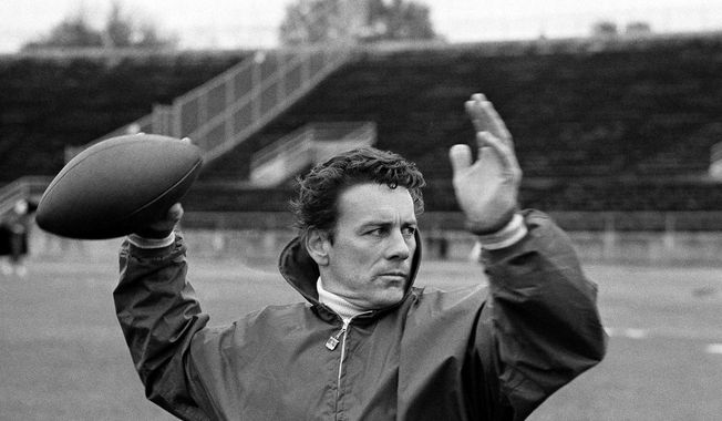 Len Dawson of the Kansas City Chiefs running through passing drills with receivers in New Orleans to prepare for the Super Bowl, in January 1970. Dawson, the 87-year-old Hall of Fame quarterback who led the  Chiefs to their first Super Bowl title, has entered hospice care in Kansas City, Mo. KMBC-TV, the Kansas City station where Dawson began his broadcasting career in 1966, confirmed Dawson is in hospice care through his wife, Linda. (AP Photo, File)