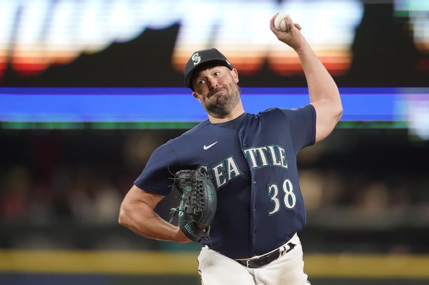 Seattle Mariners starting pitcher Robbie Ray throws against the Washington Nationals during the sixth inning of a baseball game, Tuesday, Aug. 23, 2022 in Seattle. (AP Photo/Ted S. Warren)