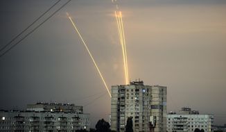 Russian rockets are launched against Ukraine from Russia&#39;s Belgorod region at dawn in Kharkiv, Ukraine, Aug. 15, 2022. (AP Photo/Vadim Belikov, File)