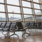 Empty chairs at an airport (Galina-Photo via Shutterstock) **FILE**