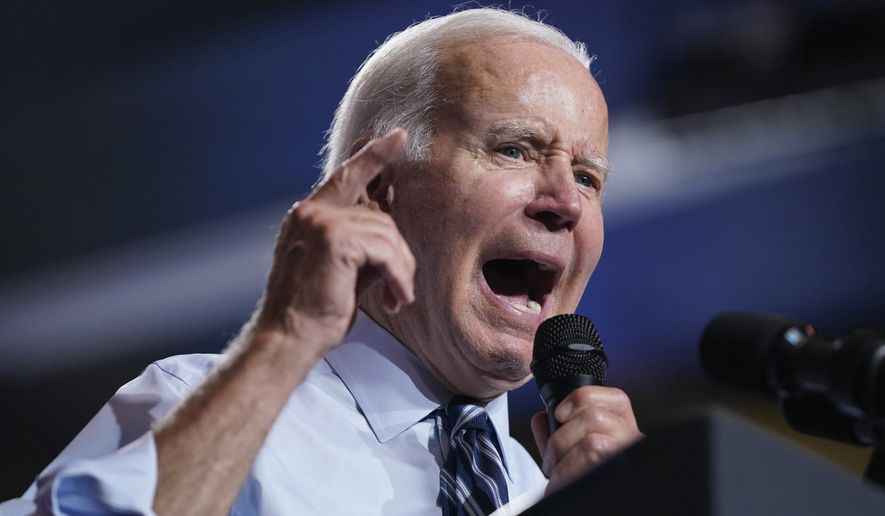 President Joe Biden speaks during a rally hosted by the Democratic National Committee at Richard Montgomery High School, Thursday, Aug. 25, 2022, in Rockville, Md. (AP Photo/Evan Vucci)