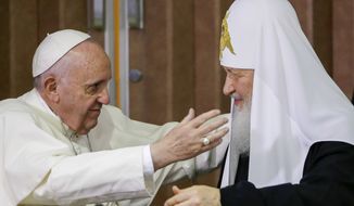 Pope Francis, left, reaches to embrace Russian Orthodox Patriarch Kirill after signing a joint declaration at the Jose Marti International airport in Havana, Cuba o Feb. 12, 2016. The head of the Russian Orthodox Church has canceled his planned attendance at an interfaith meeting in Kazakhstan in September where he was expected to meet with Pope Francis, a top Orthodox official said, in a sign of further deterioration in relations over Russia’s war in Ukraine. (AP Photo/Gregorio Borgia, Pool)