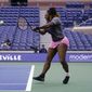 Serena Williams practices at Arthur Ashe Stadium before the start of the U.S. Open tennis tournament in New York, Thursday, Aug. 25, 2022. (AP Photo/Seth Wenig)
