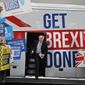 Britain&#39;s Prime Minister Boris Johnson addresses his supporters prior to boarding his General Election campaign trail bus in Manchester, England, Friday, Nov. 15, 2019. The moving vans have already started arriving in Downing Street, as Britain&#39;s Conservative Party prepares to evict Johnson. Debate about what mark he will leave on his party, his country and the world will linger long after he departs in September. (AP Photo/Frank Augstein, Pool, File)