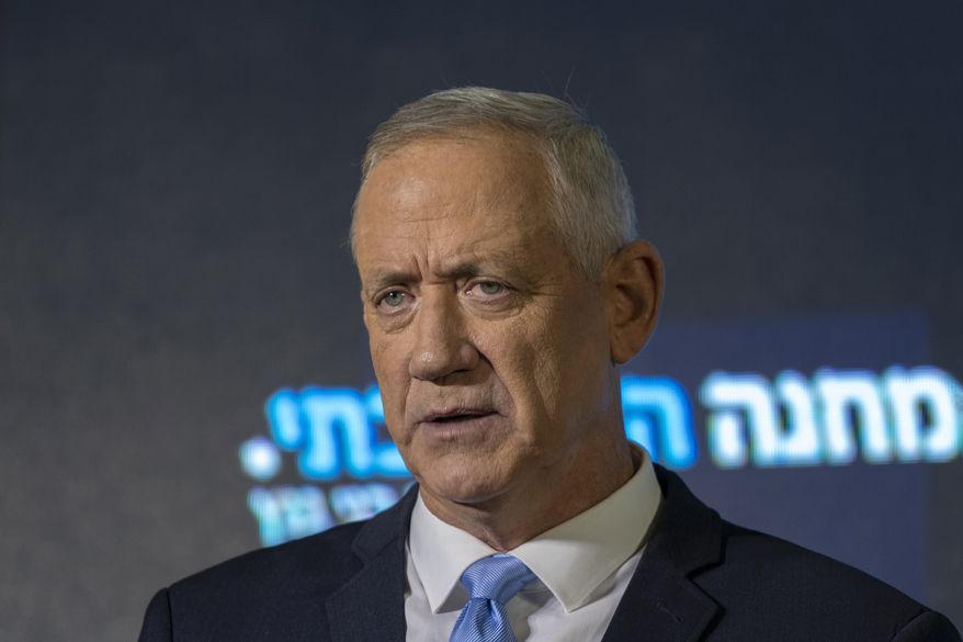 Benny Gantz speaks at the announcement of former IDF chief Gadi Eisenkot&#39;s election bid in Ramat Gan, Israel, Sunday, Aug. 14, 2022.  Gantz said Friday, Aug. 26, it was important to maintain capabilities for “defensive and offensive purposes” as he met with a senior U.S. official to reiterate Israel&#39;s opposition to an emerging nuclear deal with Iran. (AP Photo/ Tsafrir Abayov, File)