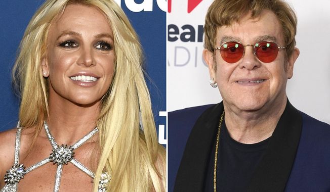 This combination of photos show Britney Spears at the 29th annual GLAAD Media Awards in Beverly Hills, Calif., on April 12, 2018, left, and Elton John at the iHeartRadio Music Awards on Thursday, May 27, 2021, in Los Angeles. Spears and John have collaborated for the first time, creating the slinky, club-ready single &amp;quot;Hold Me Closer&amp;quot; that sees the pop icons take old sounds and fashion something new. (AP Photo)