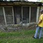 Mal Moses looks over some of the remaining damage to his home from Hurricane Harvey in 2017, Thursday, Aug. 25, 2022, in Houston. A local nonprofit, West Street Recovery, ultimately helped repair his home. (AP Photo/David J. Phillip)