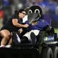 Poe, the Baltimore Ravens&#39; mascot, sits on a medical cart during halftime of a preseason NFL football game between the Ravens and the Washington Commanders, Saturday, Aug. 27, 2022, in Baltimore. (AP Photo/Nick Wass) **FILE**