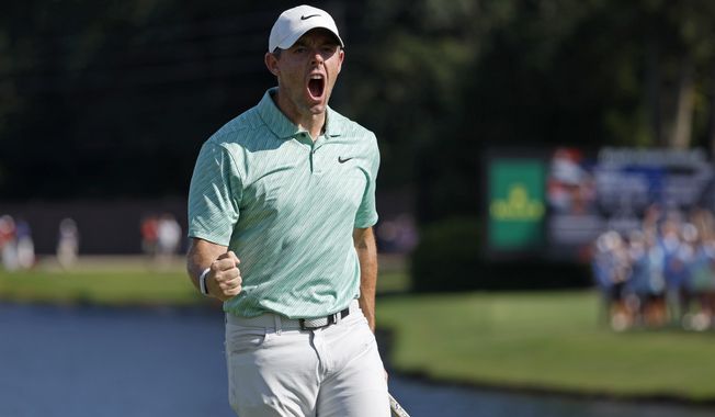 Rory McIlroy reacts after making a birdie putt on the fifteenth green during the final round of the Tour Championship golf tournament at East Lake Golf Club Sunday, Aug. 28, 2022, in Atlanta. (Jason Getz/Atlanta Journal-Constitution via AP) **FILE**