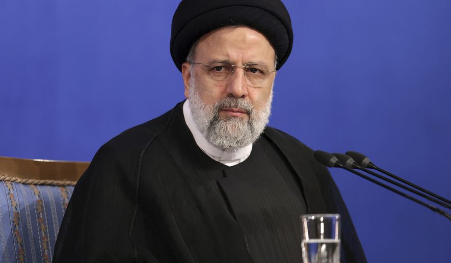 In this photo released by the official website of the office of the Iranian Presidency, President Ebrahim Raisi listens to a question during a press conference in Tehran, Iran, Monday, Aug. 29, 2022. Raisi warned that any roadmap to restore Tehran&#39;s tattered nuclear deal with world powers must see international inspectors end their probe on man-made uranium particles found at undeclared sites in the country. (Iranian Presidency Office via AP)
