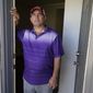 Rolando José Cisneros Borroto in his apartment, Friday, Aug. 26, 2022, in Algona, Iowa. (AP Photo/Charlie Neibergall)