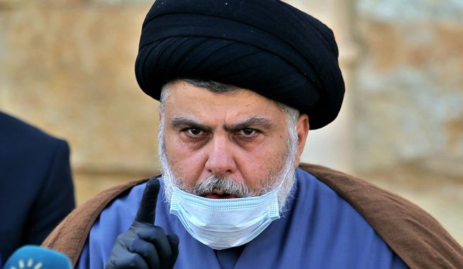 Influential Shiite cleric Muqtada al-Sadr speaks during a press conference in Najaf, Iraq, Feb. 10, 2021. Al-Sadr who&#x27;s followers have been staging a sit-in outside Iraq&#x27;s parliament announced his resignation from politics and the closure of his party&#x27;s offices on Monday, Aug. 29, 2022. It is an unexpected plot twist more than four weeks after his supporters stormed the parliament building to prevent his Iran-backed rivals from forming a government. (AP Photo/Anmar Khalil, File)