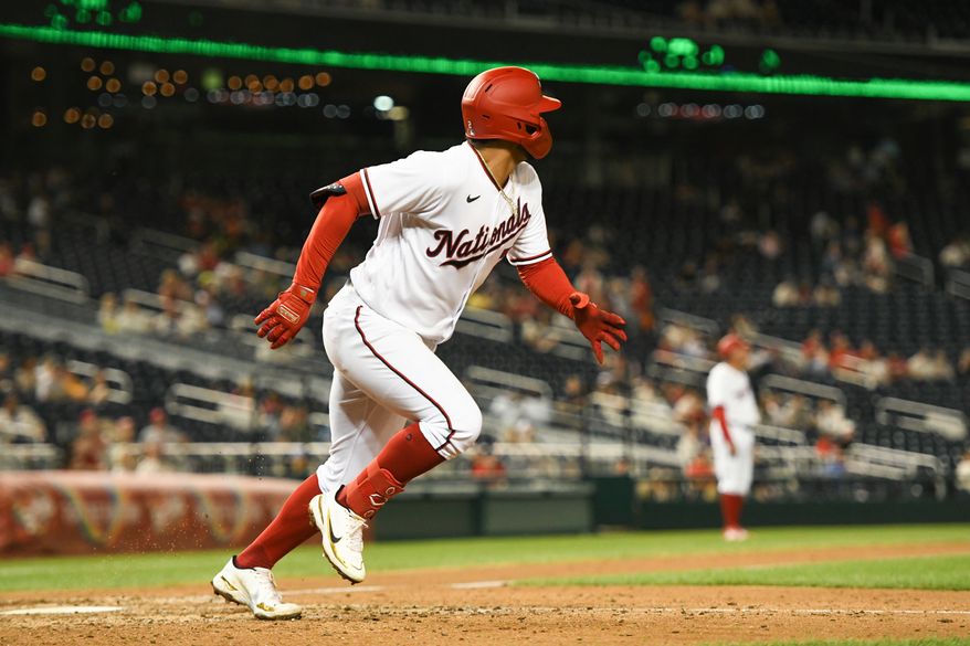 Washington Nationals second baseman Luis Garcia (2) watches his home run clear the fence in left field during the 8th inning in a game against the Oakland A&#x27;s at Nationals Park in Washington D.C., August 30, 2022. (Photo by All-Pro Reels)