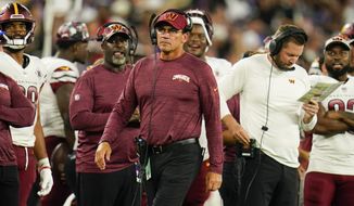 Washington Commanders head coach Ron Rivera stands on the sideline in the first half of a preseason NFL football game against the Baltimore Ravens, Saturday, Aug. 27, 2022, in Baltimore. (AP Photo/Julio Cortez)