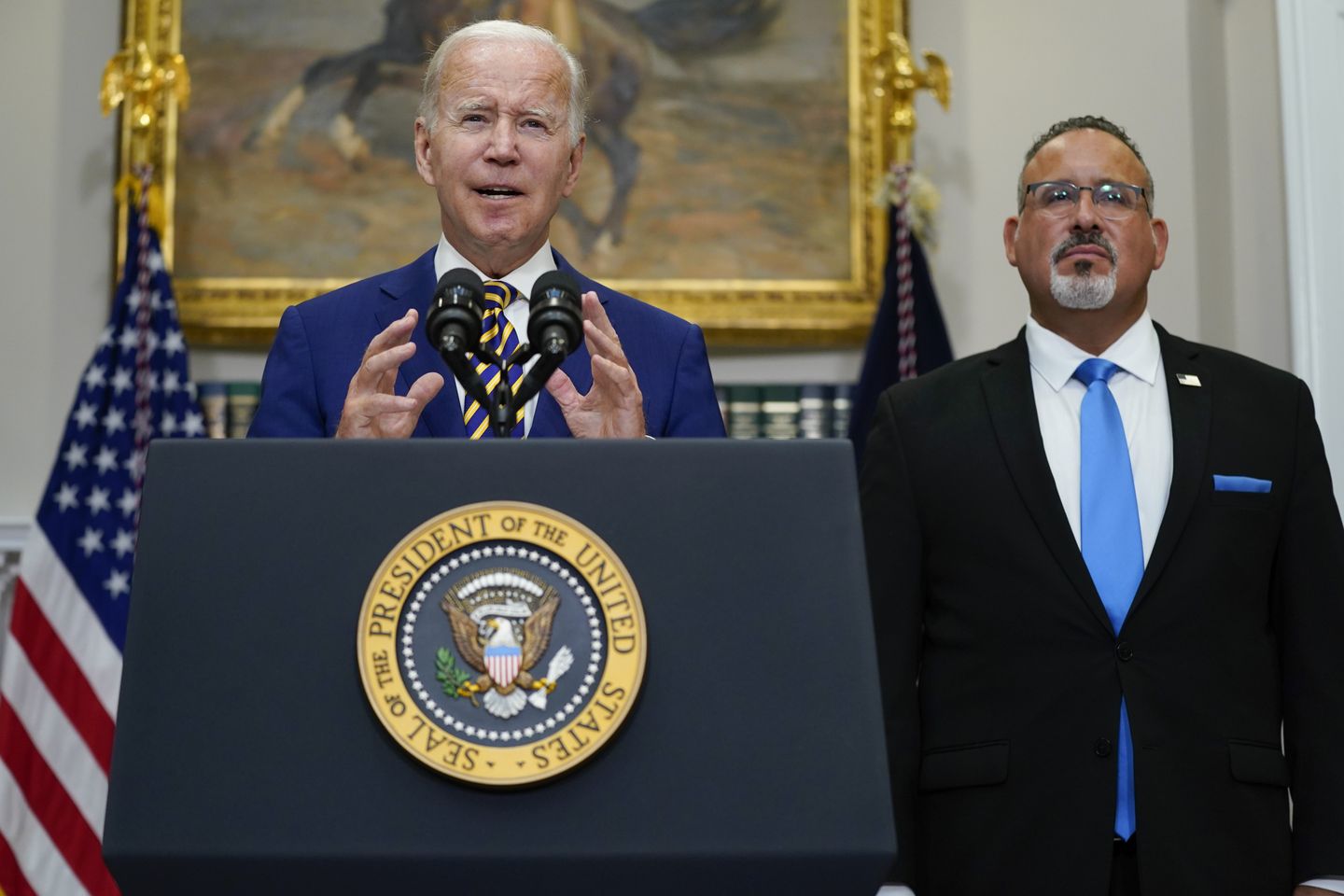 Shaky start for Biden's college debt relief, loan servicers in the dark about the plan