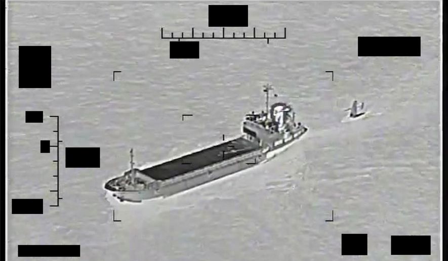 This photo released by the U.S. Navy shows the Iranian Revolutionary Guard ship Shahid Bazair, left, towing a U.S. Navy Saildrone Explorer in the Persian Gulf on Tuesday, Aug. 30, 2022. The U.S. Navy&#x27;s Mideast-based 5th Fleet said Tuesday that Iran&#x27;s paramilitary Revolutionary Guard seized and later let go of a U.S. sea drone in the Persian Gulf. Iran did not immediately acknowledge the incident, though it comes amid heightened tensions over Tehran&#x27;s tattered nuclear deal with world powers. (U.S. Navy via AP)