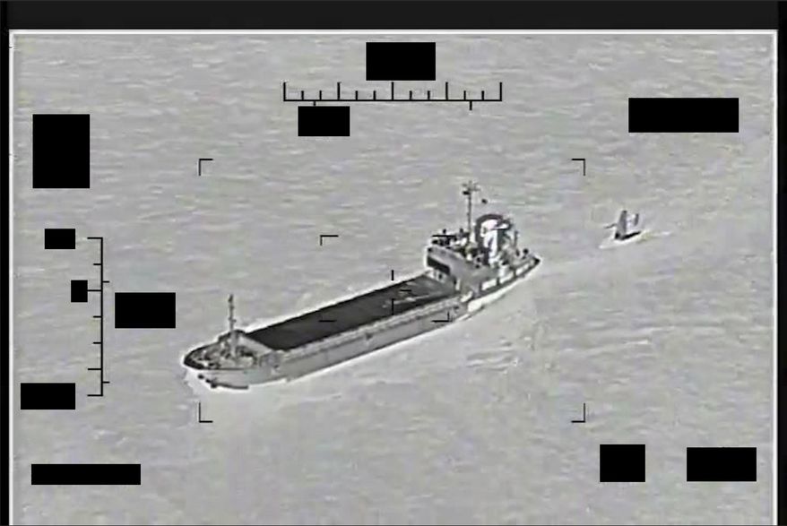 This photo released by the U.S. Navy shows the Iranian Revolutionary Guard ship Shahid Bazair, left, towing a U.S. Navy Saildrone Explorer in the Persian Gulf on Tuesday, Aug. 30, 2022. The U.S. Navy&#x27;s Mideast-based 5th Fleet said Tuesday that Iran&#x27;s paramilitary Revolutionary Guard seized and later let go of a U.S. sea drone in the Persian Gulf. Iran did not immediately acknowledge the incident, though it comes amid heightened tensions over Tehran&#x27;s tattered nuclear deal with world powers. (U.S. Navy via AP)