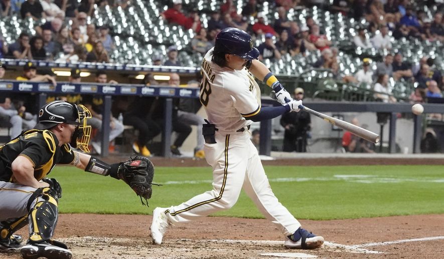 Milwaukee Brewers&#x27; Keston Hiura hits a walk off two-run home during the ninth inning of a baseball game against the Pittsburgh Pirates Monday, Aug. 29, 2022, in Milwaukee. (AP Photo/Morry Gash)