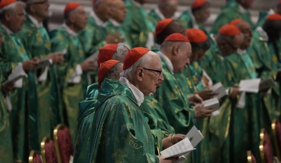 Cardinals attend a mass celebrated by Pope Francis in St. Peter&#39;s Basilica at The Vatican for the newly-created cardinals, Tuesday, Aug. 30, 2022, that concludes a two-day consistory on the Praedicate Evangelium (Preach the Gospel) apostolic constitution reforming the Roman Curia which was promulgated in March. Francis created 20 new cardinals on Saturday. (AP Photo/Andrew Medichini)
