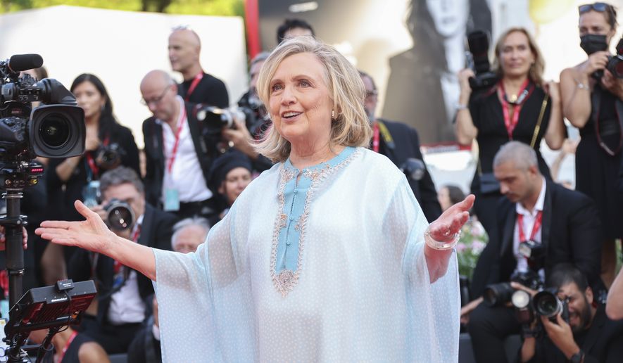 Hillary Clinton poses for photographers upon arrival at the premiere of the film &quot;White Noise&quot; and the opening ceremony during the 79th edition of the Venice Film Festival in Venice, Italy, Wednesday, Aug. 31, 2022. (Photo by Joel C Ryan/Invision/AP) ** FILE **