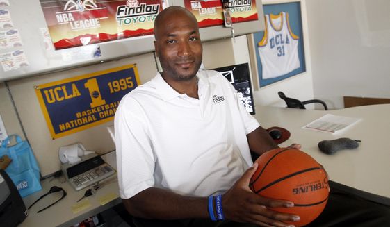 In this Sept. 18, 2010, file photo, former UCLA basketball player Ed O&#39;Bannon Jr. sits in his office in Henderson, Nev. NIL&#39;s blossoming started with a seed: a 2009 class-action lawsuit filed by former UCLA basketball player Ed O&#39;Bannon that argued the NCAA should not be allowed to use the likeness of football and men&#39;s basketball players — past and present — to make money. (AP Photo/Isaac Brekken, File)