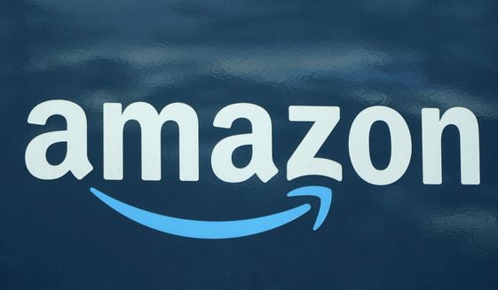 An Amazon logo appears on an Amazon delivery van in Boston, Oct. 1, 2020. On Thursday, Sept. 1, 2022, a hearing officer for a federal labor board rebuffed Amazon&#39;s attempt to scrap a historic union win at a warehouse on Staten Island, N.Y., handing victory to organizers in what could be a very long battle for recognition. (AP Photo/Steven Senne, File)