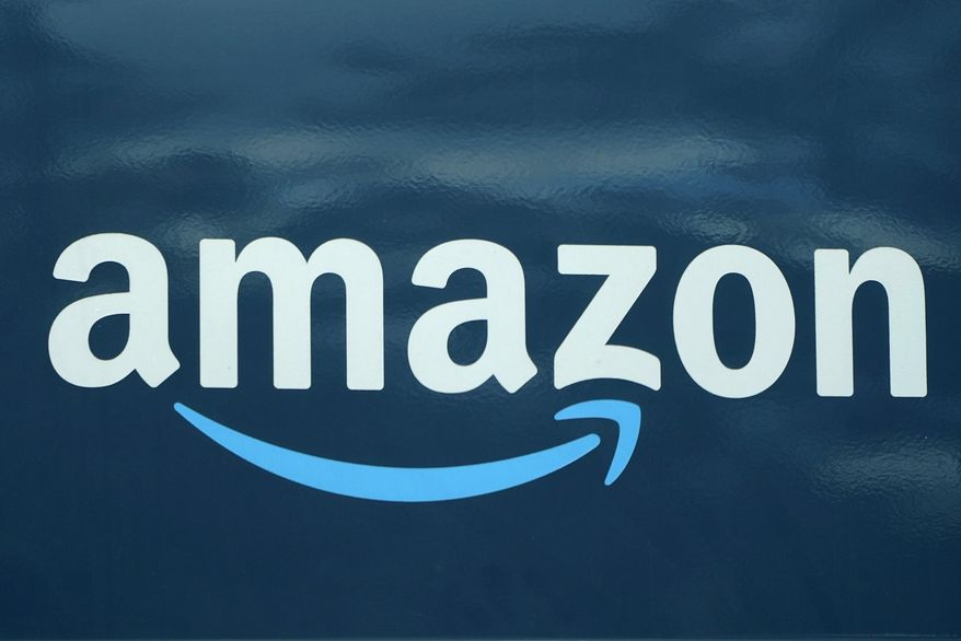 An Amazon logo appears on an Amazon delivery van in Boston, Oct. 1, 2020. On Thursday, Sept. 1, 2022, a hearing officer for a federal labor board rebuffed Amazon&#x27;s attempt to scrap a historic union win at a warehouse on Staten Island, N.Y., handing victory to organizers in what could be a very long battle for recognition. (AP Photo/Steven Senne, File)