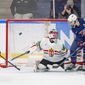 Goalkeeper Aniko Nemeth of Hungary in action with Hilary Knight of the United States during The IIHF World Championship Woman&#39;s ice hockey match between The United States and Hungary in Herning, Denmark, Thursday, Sept. 1, 2022. (Bo Amstrup/Ritzau Scanpix via AP)