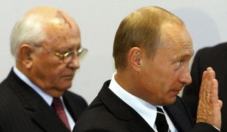 Russian President Vladimir Putin, right, and former Soviet leader Mikhail Gorbachev arrives at the German-Russian Petersburg Dialogue conference in Dresden on Tuesday, Oct. 10, 2006. (AP Photo/Markus Schreiber, File)